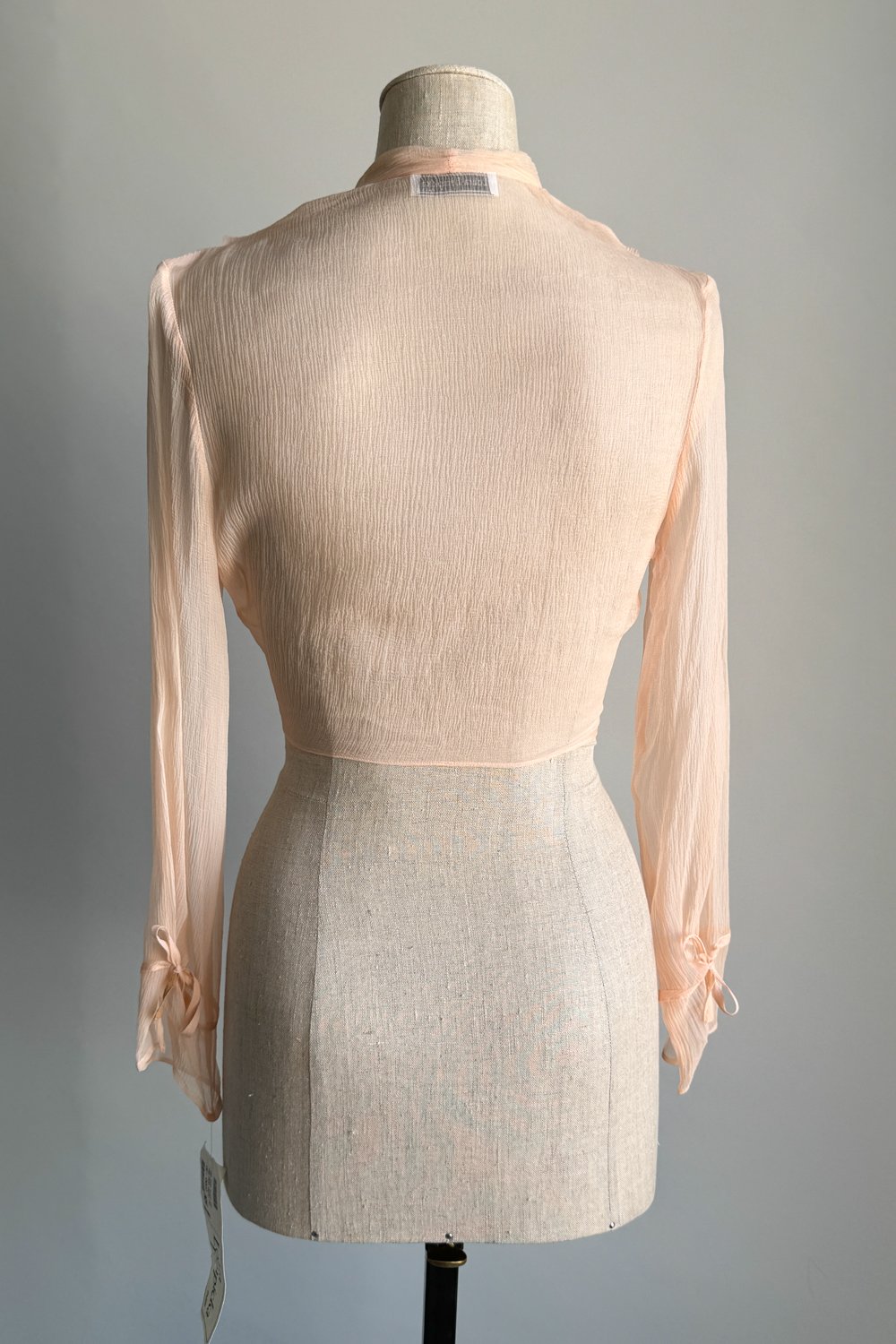 EMERIEU-Lolita-Lempicka-1990s-vintage-blush-pink-draped-tie-crop-long-sleeve-blouse-4