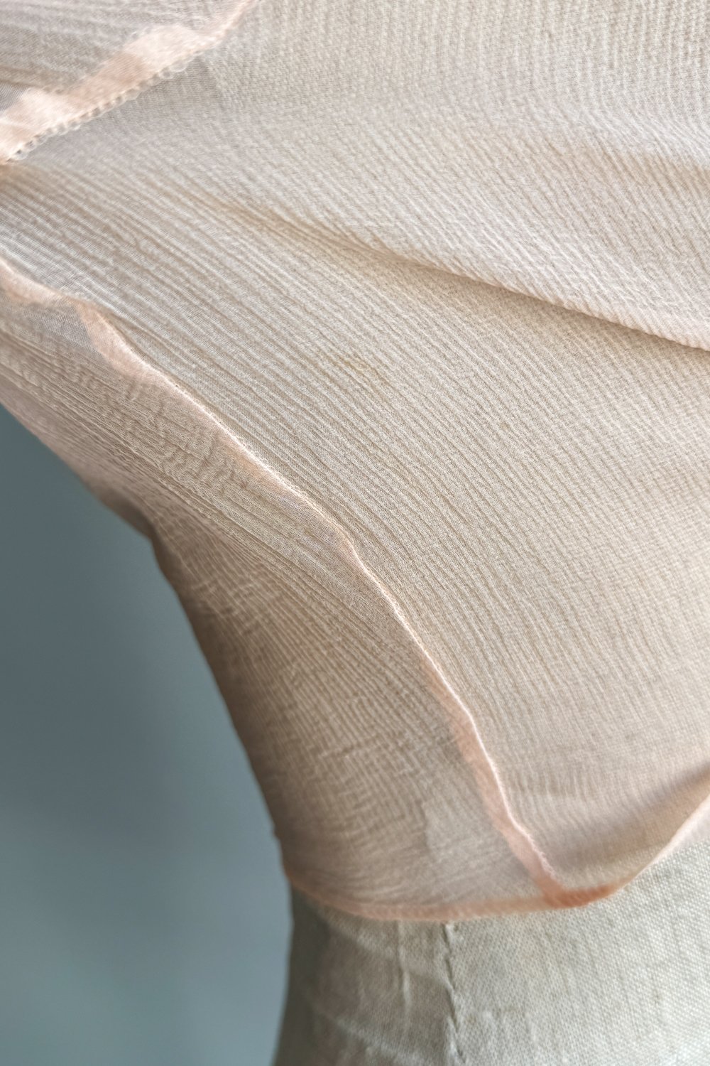 EMERIEU-Lolita-Lempicka-1990s-vintage-blush-pink-draped-tie-crop-long-sleeve-blouse-flaw