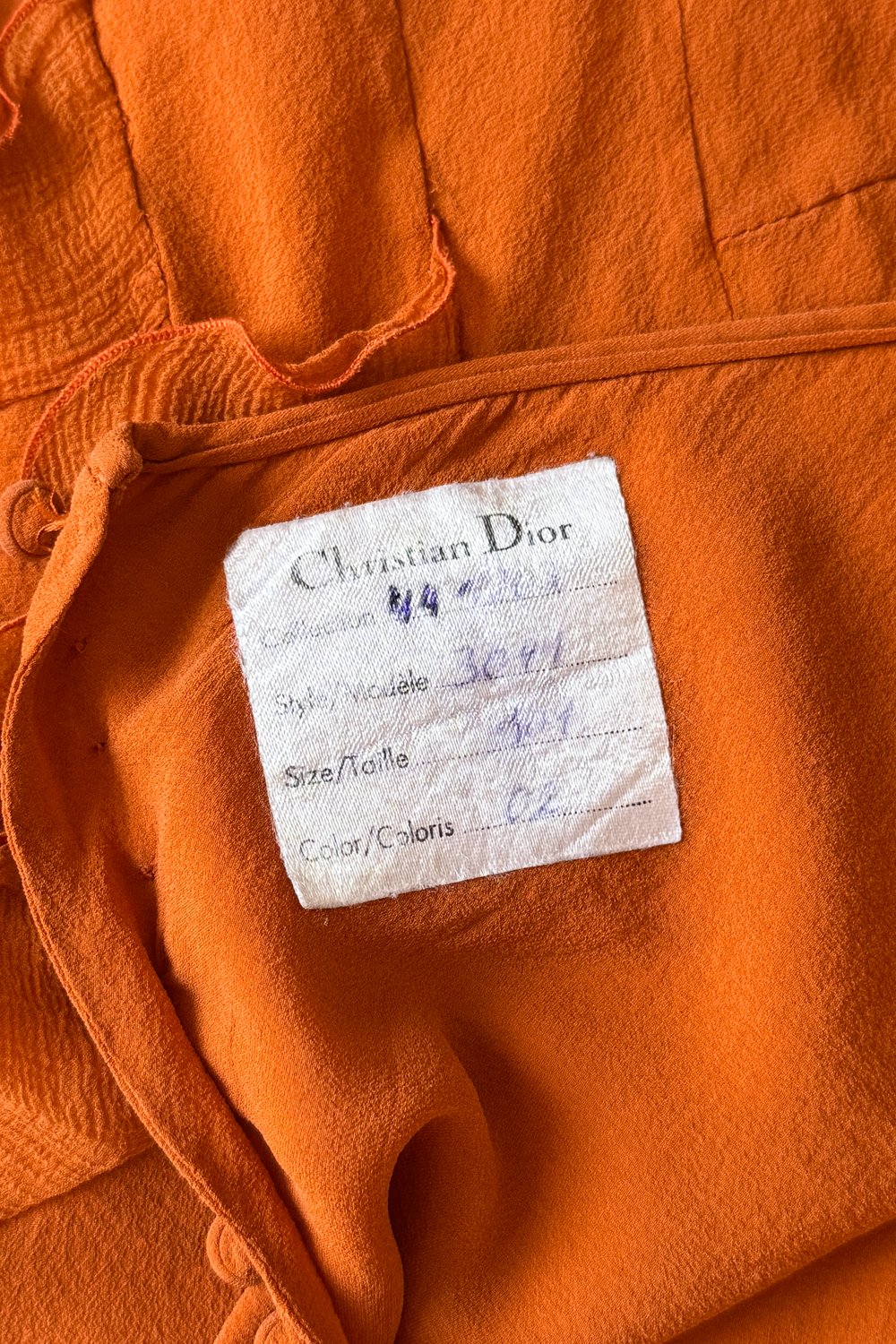 EMERIEU-Christian-Dior-by-John-Galliano-2000s-burnt-orange-silk-ruffle-mini-skirt-label